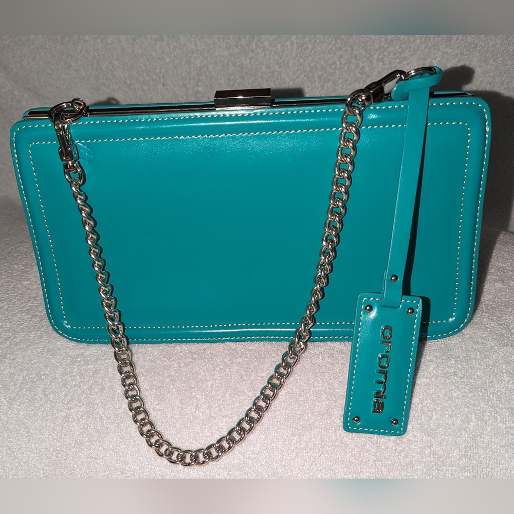 Cromia Italian teal green handbag.
